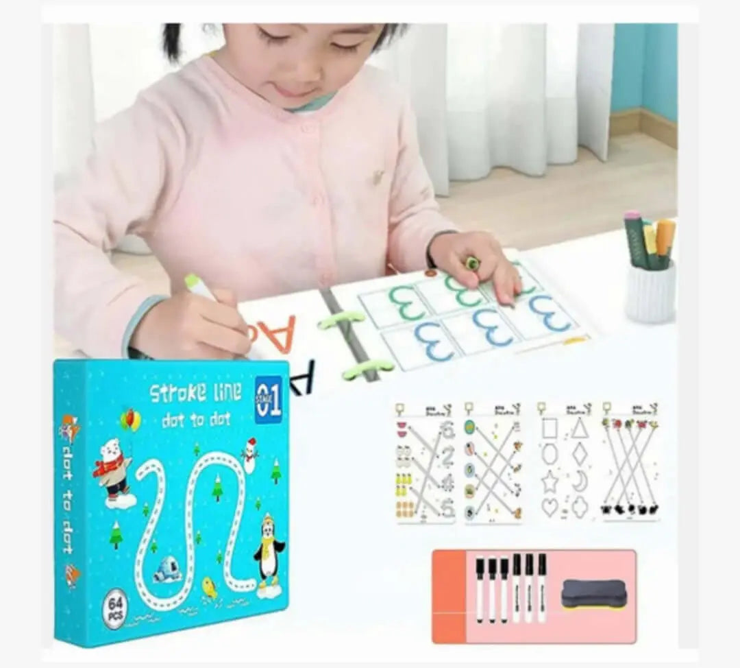 Une petite fille écrivant sur le cahier